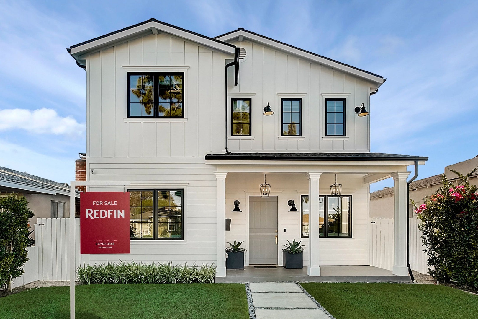 large home with front yard