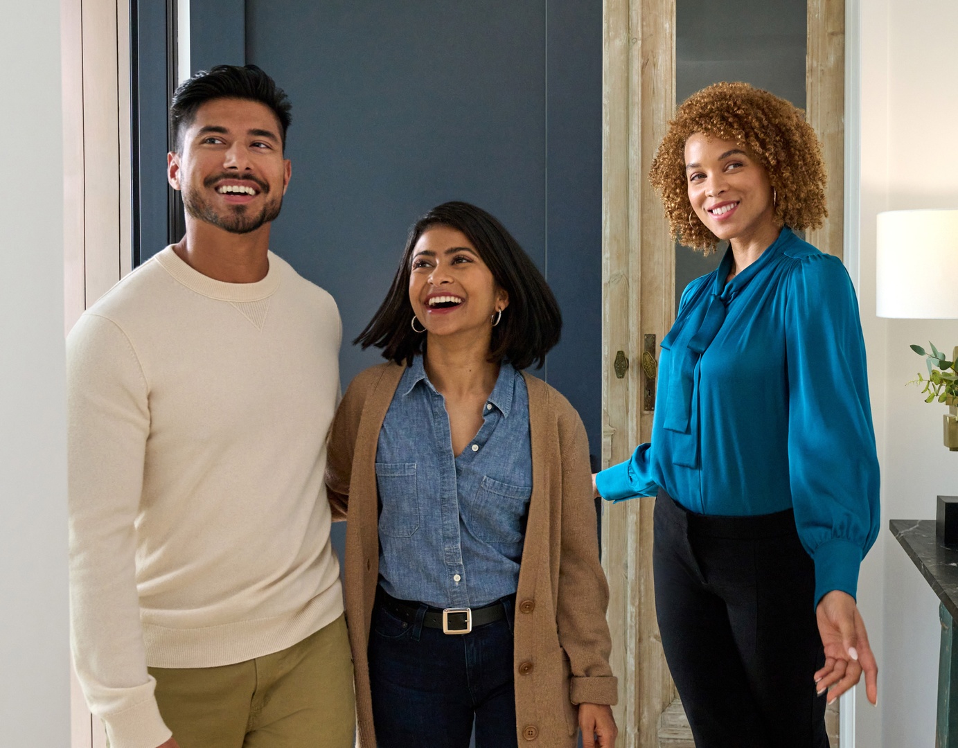 People going on a house tour lead by a Redfin agent.