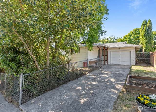 Property at 1214 E 61st St, Tacoma, WA 98404, 4 beds, 2 baths