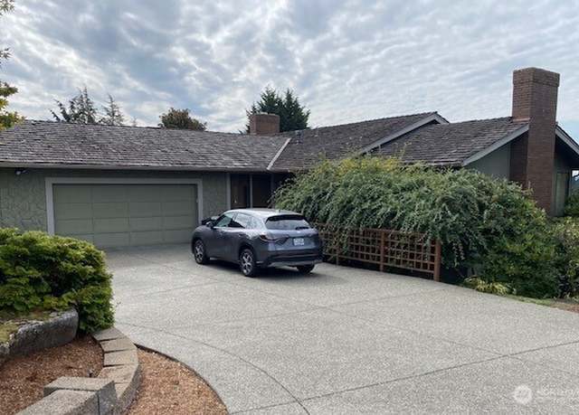 Property at 8811 NE 15th Pl, Clyde Hill, WA 98004, 5 beds, 2.5 baths