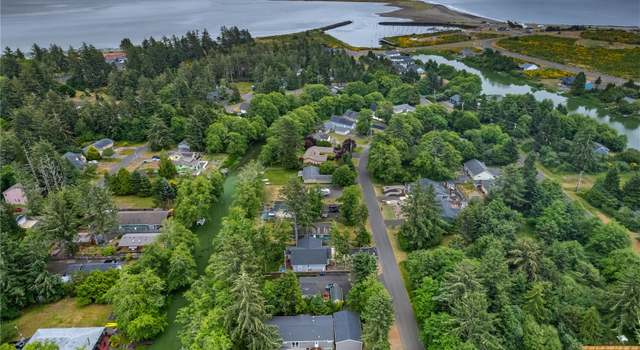 Photo of 930 Falls Of Clyde Loop SE, Ocean Shores, WA 98569