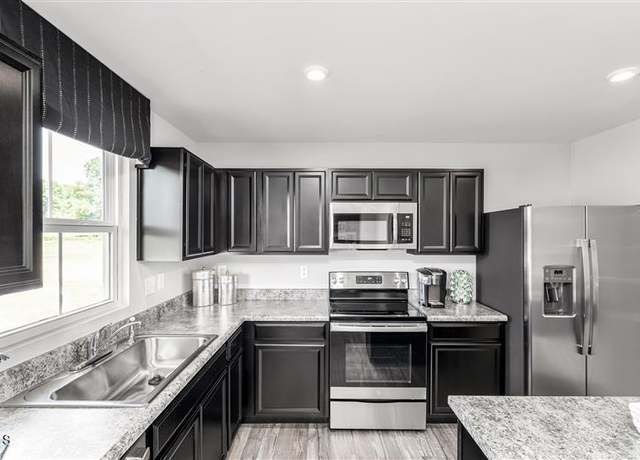 Property at 304 Grand Silo Rd, Raleigh, NC 27603, 3 beds, 2.5 baths