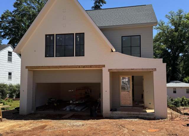Property at 1002 Canterbury Rd, Raleigh, NC 27607, 4 beds, 3.5 baths
