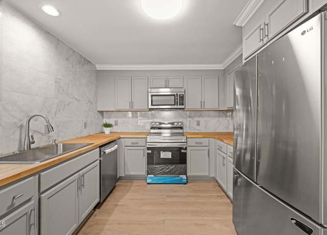 Property at 1411 Rosewood St, Durham, NC 27701, 4 beds, 3 baths