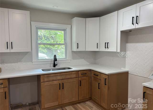 Property at 1231 Dean St, Charlotte, NC 28216, 3 beds, 2 baths