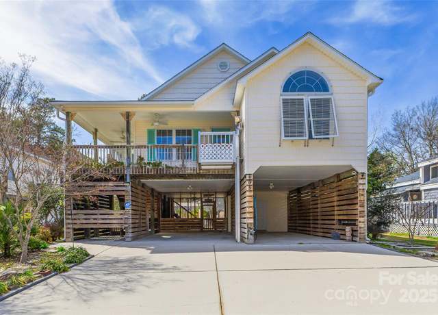 Property at 105 SW 3rd St, Oak Island, NC 28465, 3 beds, 2 baths