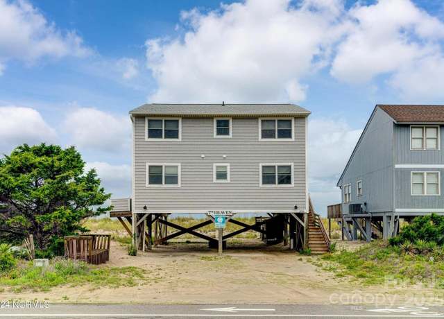 Property at 309 E Beach Dr, Oak Island, NC 28465, 5 beds, 2 baths