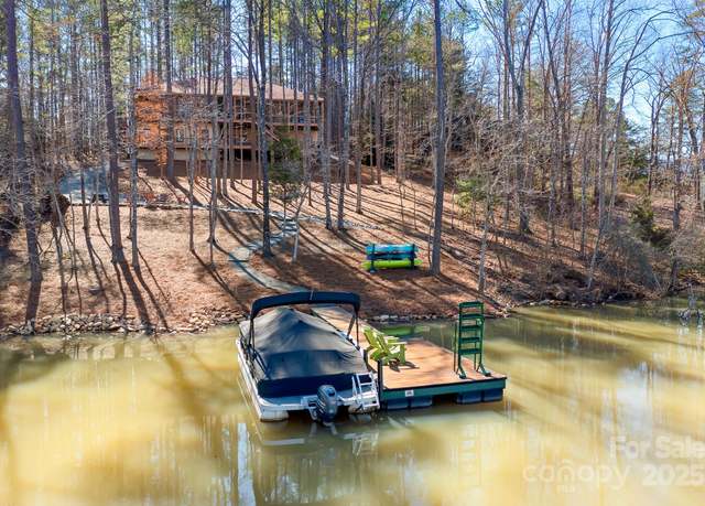 Property at 940 Hawk Ridge Dr, Mill Spring, NC 28756, 4 beds, 5 baths