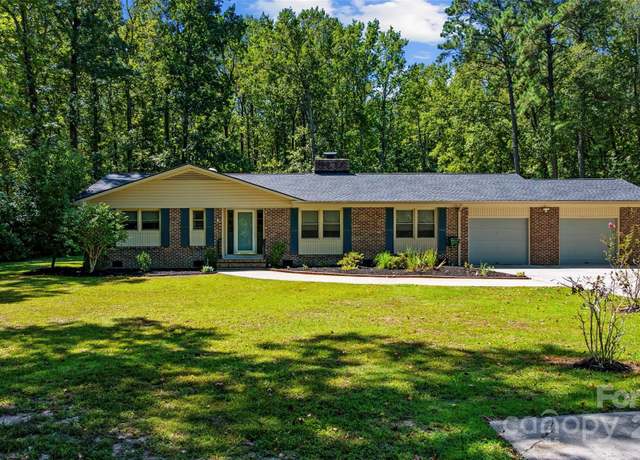 Property at 10 Pinewood Dr, Carolina Shores, NC 28467, 3 beds, 2 baths