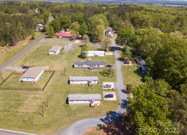 Property at 40724 Nc 740 Hwy, New London, NC 28127, 6 beds, 4 baths