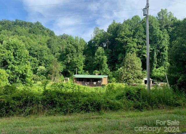 Property at 5712 Holbert Cove Rd, Saluda, NC 28773, 3 beds, 2 baths