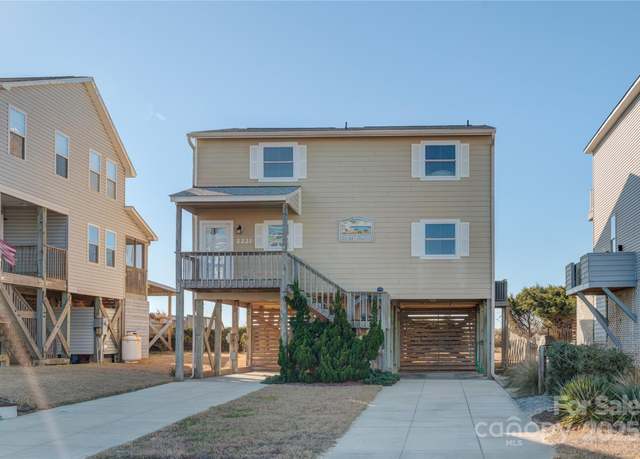 Property at 2221 E Beach Dr, Oak Island, NC 28465, 5 beds, 3 baths