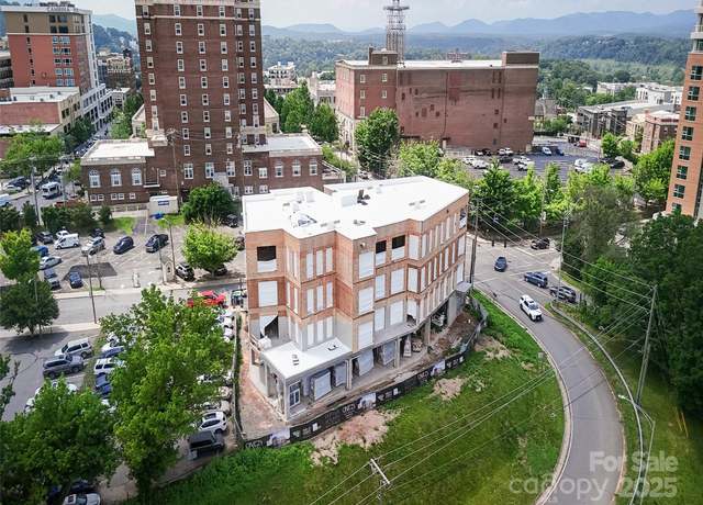 Property at 123 Haywood St #202, Asheville, NC 28801, 1 bed, 2 baths