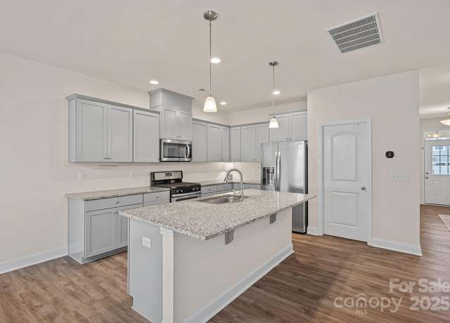 Property at 8628 Addingham Dr, Charlotte, NC 28269, 5 beds, 3 baths