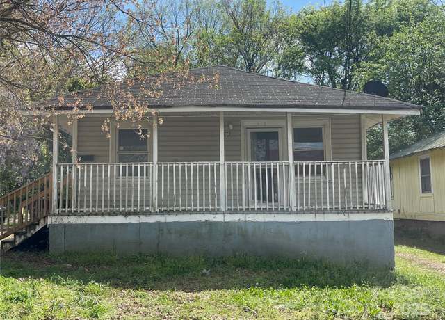 Property at 410 Mill Rd, Charlotte, NC 28216, 4 beds, 2 baths