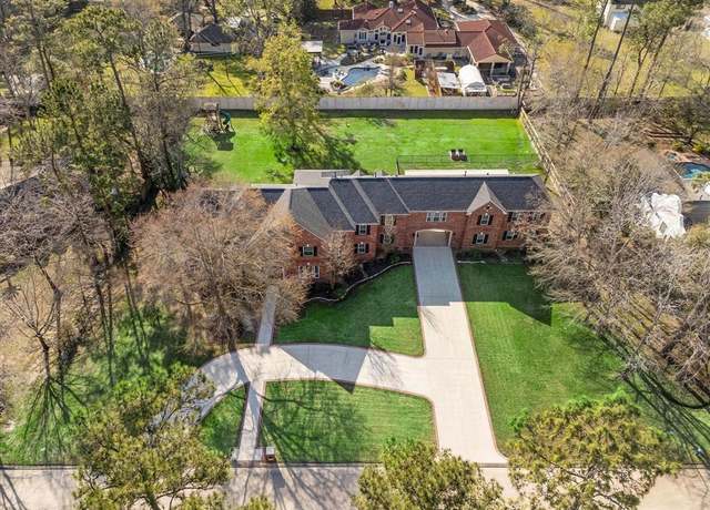 Property at 15 Enchanted Woods Dr, Kingwood, TX 77339, 6 beds, 6 baths
