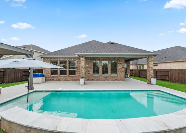 Property at 29510 Enchanted Breeze Ln, Katy, TX 77494, 4 beds, 3.5 baths