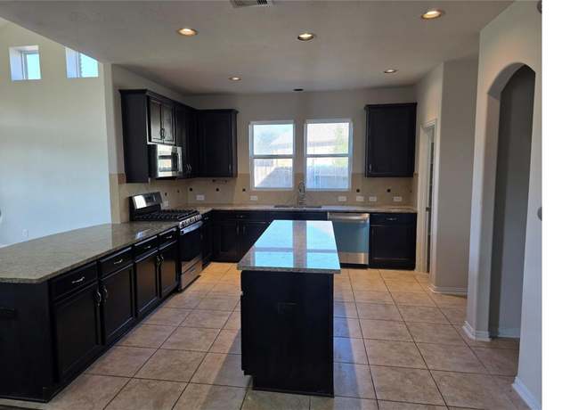 Property at 9702 S Layton Ridge Dr, Humble, TX 77396, 4 beds, 2.5 baths