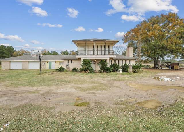Property at 850 County Road 2145, Cleveland, TX 77327, 4 beds, 2 baths