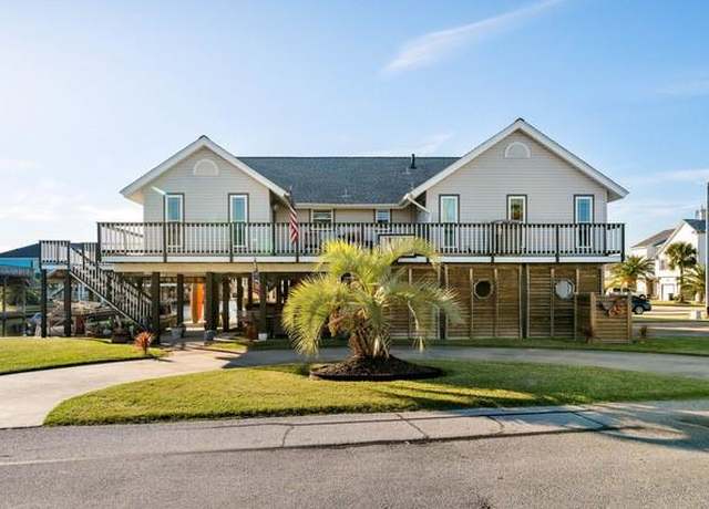 Property at 1303 Hawaii Dr, Tiki Island, TX 77554, 3 beds, 2 baths