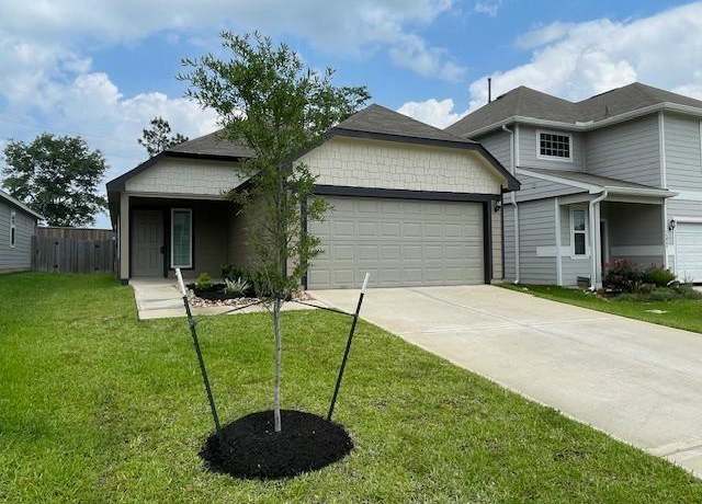 Property at 14041 Lamprey Dr, Conroe, TX 77384, 4 beds, 2 baths