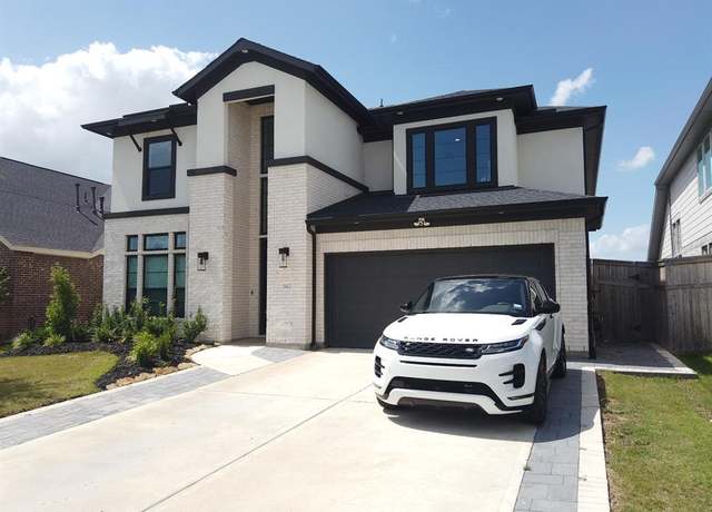 Property at 31422 Beacon Cove Trl, Fulshear, TX 77441, 5 beds, 4.5 baths