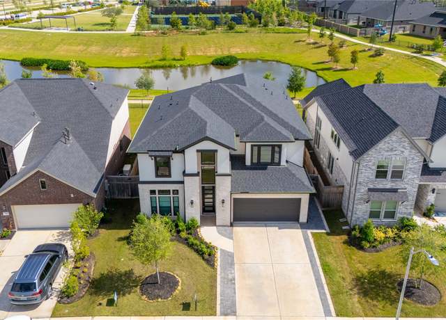 Property at 31422 Beacon Cove Trl, Fulshear, TX 77441, 5 beds, 4.5 baths