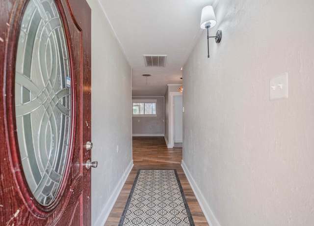 Property at 1416 W Sealy St, Alvin, TX 77511, 4 beds, 3 baths