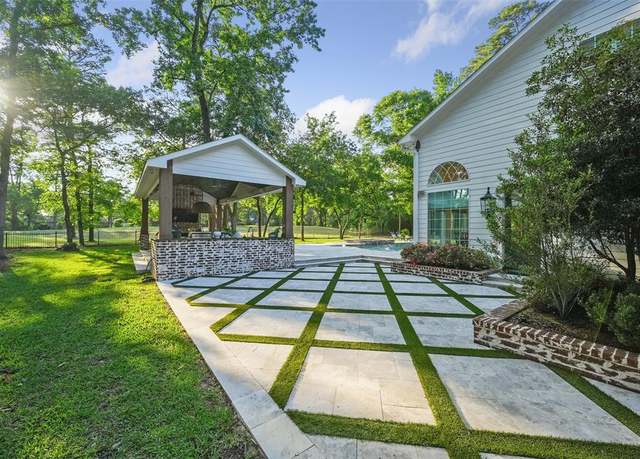 Property at 2207 Longmire Rd, Conroe, TX 77304, 5 beds, 4.5 baths