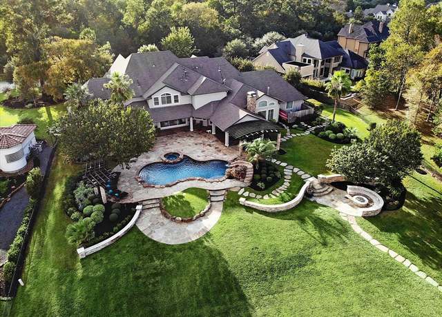 Property at 5915 Royal Point Ct, Kingwood, TX 77345, 6 beds, 8 baths