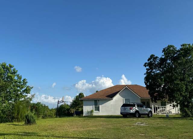 Property at 2420 County Road 3542, Cleveland, TX 77327, 4 beds, 2 baths