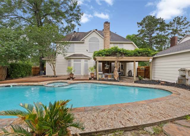 Property at 1911 Tawny Oaks Dr, Kingwood, TX 77345, 4 beds, 3.5 baths