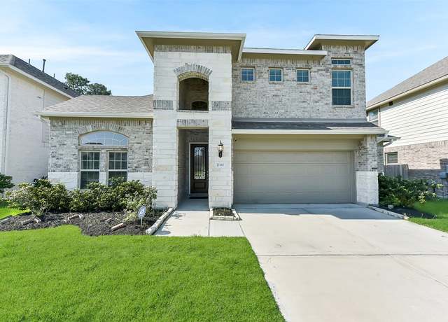 Property at 21444 Kings Guild Ln, Kingwood, TX 77339, 4 beds, 3 baths