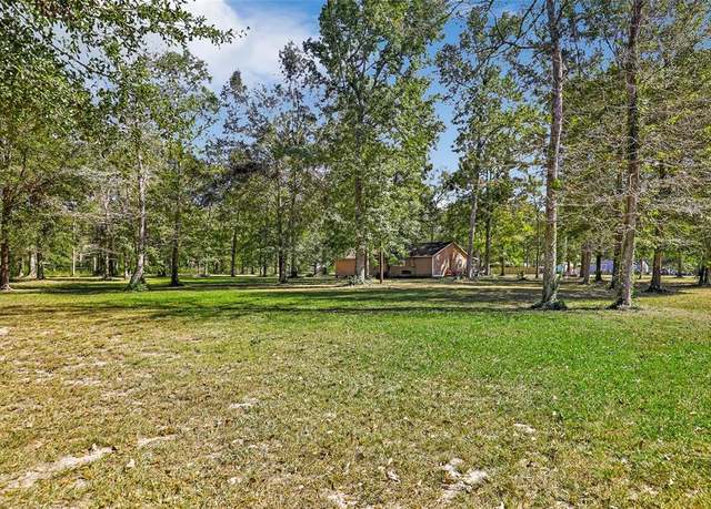 Property at 380 County Road 3800, Cleveland, TX 77328, 5 beds, 2 baths