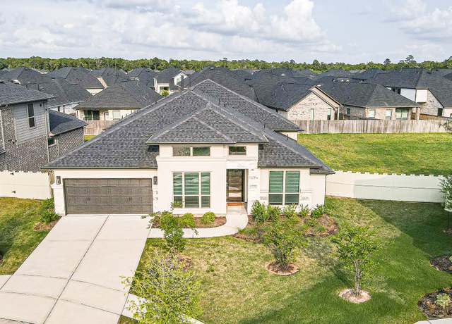 Property at 10383 Bayou Oaks Dr, Conroe, TX 77385, 4 beds, 3.5 baths