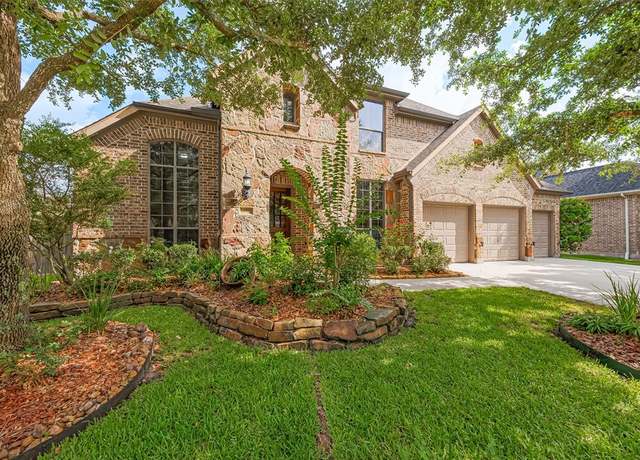 Property at 11907 Wind Cove Place Ct, Humble, TX 77346, 4 beds, 5 baths