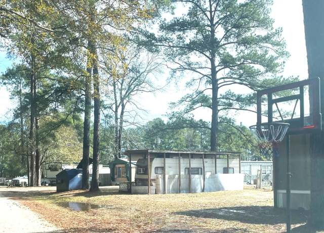 Property at 31 County Road 386 Off Fm 1725, Cleveland, TX 77327, 3 beds, 2 baths
