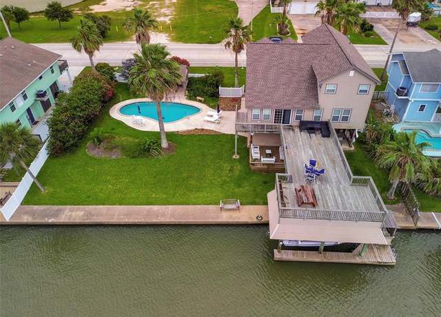 Property at 1302 Tiki Dr, Tiki Island, TX 77554, 3 beds, 2 baths