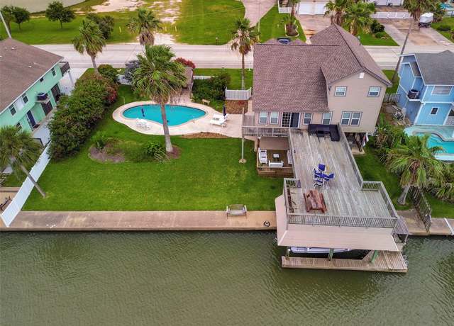 Property at 1302 Tiki Dr, Tiki Island, TX 77554, 3 beds, 2 baths