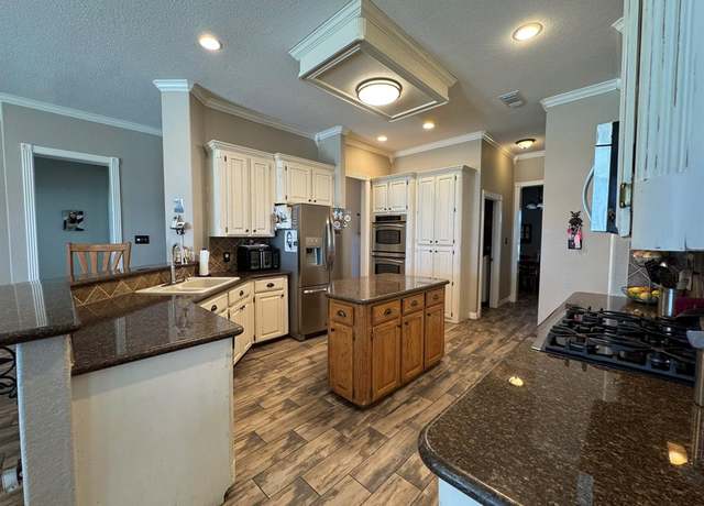 Property at 814 Sunset Trl, Angleton, TX 77515, 4 beds, 3.5 baths