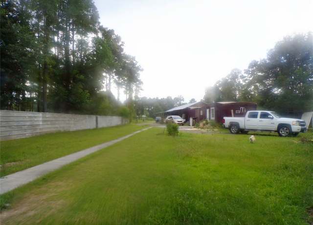 Property at 1590 County Road 5003, Cleveland, TX 77327, 3 beds, 2 baths