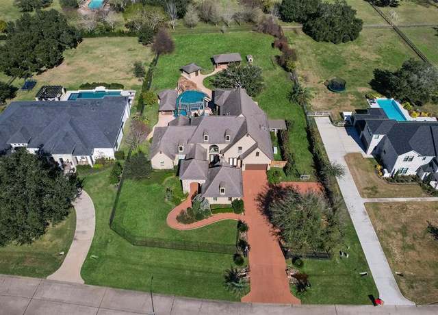 Property at 32702 Westminster Dr, Fulshear, TX 77441, 4 beds, 5 baths