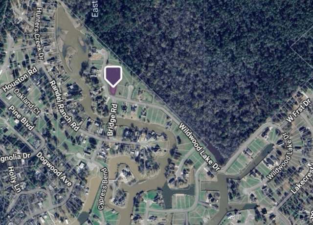Property at 23 Wildwood Lake Dr, Huntsville, TX 77340