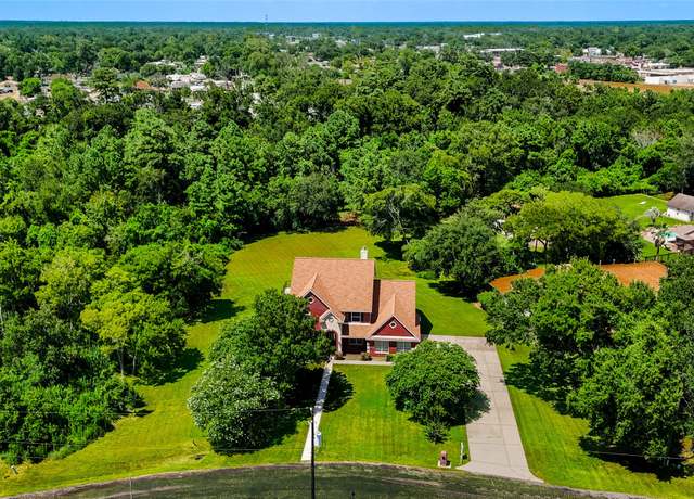 Property at 214 Whites Lake Estates Dr, Highlands, TX 77562, 4 beds, 3.5 baths