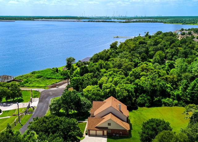 Property at 214 Whites Lake Estates Dr, Highlands, TX 77562, 4 beds, 3.5 baths