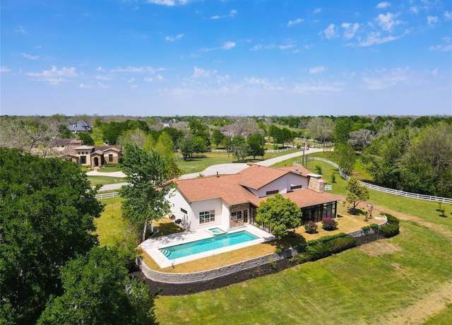 Property at 5403 E River Dr, Richmond, TX 77406, 4 beds, 5.5 baths