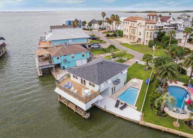 Property at 1226 Oahu Dr, Tiki Island, TX 77554, 4 beds, 3 baths