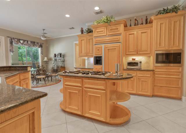 Property at 1614 Lake Wilderness Ln, Houston, TX 77345, 5 beds, 4.5 baths