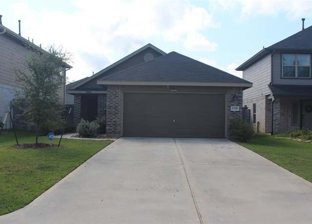 Property at 1335 Winding Willow Dr, Pinehurst, TX 77362, 4 beds, 2 baths