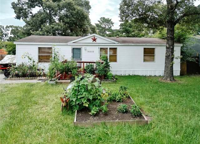 Property at 31222 Wide Oak Cir, Magnolia, TX 77355, 3 beds, 2 baths